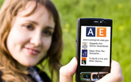 Photo of woman holding a cell phone