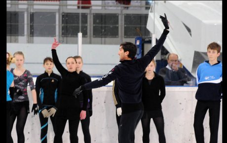 Sports Envoy and Olympic Ice Skater Evan Lysacek leads a clinic on ice in Belarus.