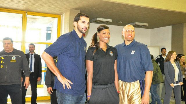 The Sports Envoys pose for a photo after they arrive in Athens.
