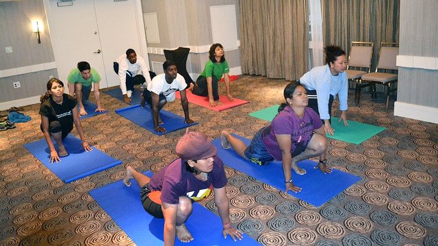 Morning yoga served as a great way to start the day for the group of visiting basketball coaches.