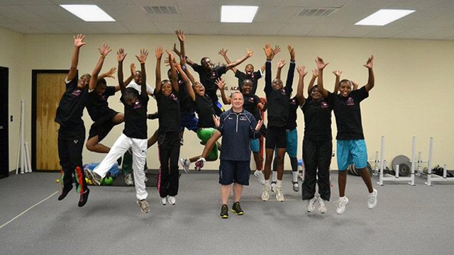 The group celebrates after a special strength and conditioning session with professional trainer Barry Lovelace.