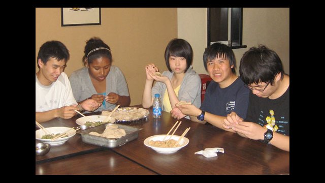 NSLI-Y students from Chicago Public Schools learn to wrap jiaozi (Chinese dumplings) at East China Normal University, Shanghai, China.