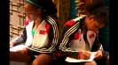 Participants work on their personal action plans to help develop girl’s sports programs in Trinidad.