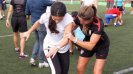Young female athletes work to perfect the skills and drills that they learned from Brandi Chastain during a soccer session. 