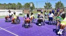 The Colombian visitors learn about disability sports firsthand at Mobility International.