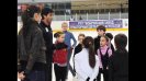 Evan Lysacek shares ice skating tips with clinic participants in Belarus.
