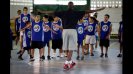 Chris Clunie, Senior Coordinator for the NBA's International Basketball Operations, leads warm-up with the young Venezuelans.