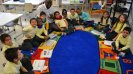 The South Sudanese basketball coaches visit a D.C.-area kindergarten class to learn about the U.S. school system.