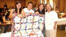 A-SMYLE students make and donate quilts for an orphanage.