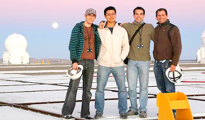 Eduardo Bendek (right) and the Optical Outreach Abroad team gathers at the Paranal Observatory platform during sunset.