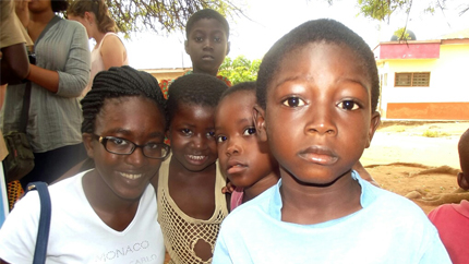 Precious (left) with kids in her Accra, Ghana neighborhood