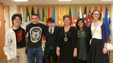 NSLI-Y alumni pose with Foreign Service Officer Bridget Gersten at a diplomatic reception for International Visitors in Boston. Pictured (L to R): Benjamin Chen, Raymond Fasano, Ryan Youkilis, Bridget Gersten (FSO), Jenna Bhaloo, and Sophie Klimasmith