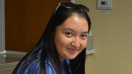 Kyrgyz FLEX student Kamila volunteers at a church in her host community that cooks meals for homeless residents.