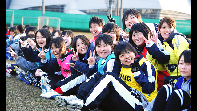 Young Japanese players watch the U.S. Women&#039;s National Soccer team practice at the Izumi Soccer Field in Sendai, Japan.