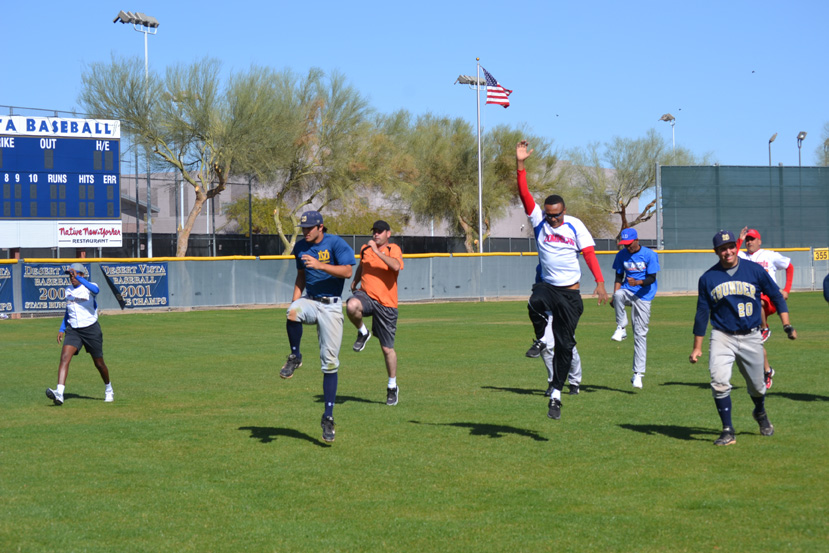 The young coaches warm-up together in the morning.