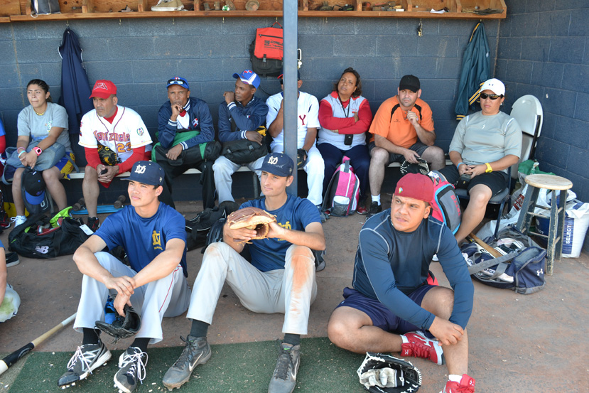 During a time-out, the young coaches receive a history lesson about the World Baseball Classic. 