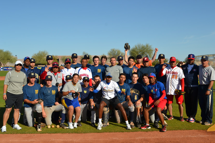 The Dominican Republic and Venezuelan visitors gather with their MLB counterparts after a full day out on the field.