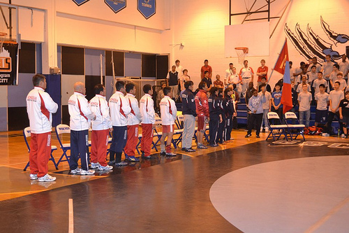 The Mongolian wrestling delegation lines up before a dual in New York.