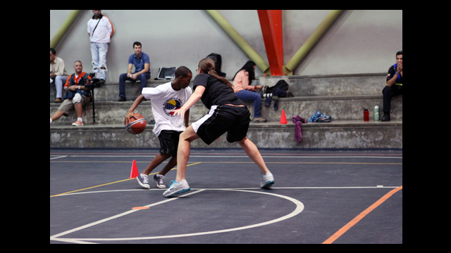 Kayte Christensen demonstrates basketball defense.