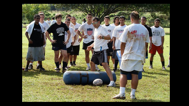 Wesley Clarke of New Zealand Rugby Union teaches rugby drills to youth in Hawaii.