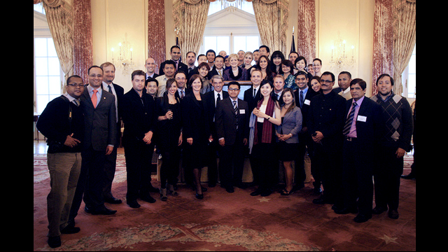 Climate Change Fellows pose with Assistant Secretary, Ann Stock.