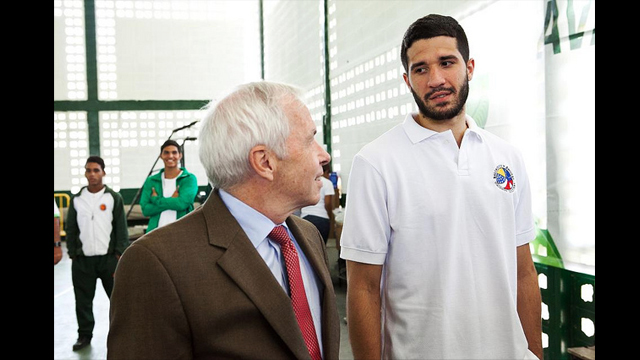 After the opening event, Charges d&#039;Affaires, James Derham, converses with Venezuelan national sports hero, Greivis Vasquez.