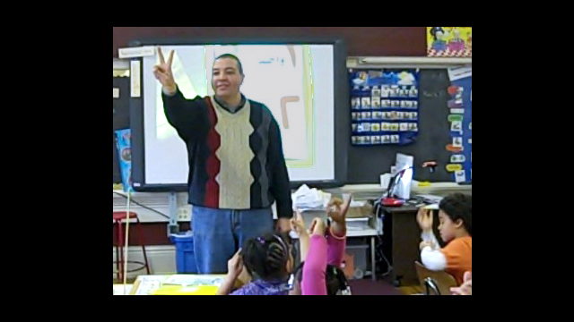 Ahmad Eleraky teaching Arabic at Pratt Community School in Minneapolis, Minnesota.