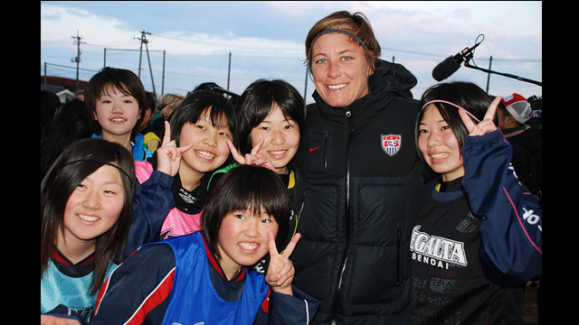 U.S. soccer forward, Abby Wambach, meets some potential future members of Japan&#039;s national soccer team.