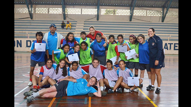 The soccer players pose for a photo post-clinic in Xela, Guatemala.