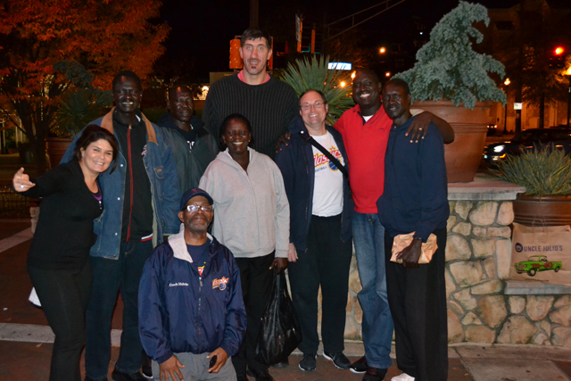 The delegation meets with Gheorghe Muresan, a former NBA player and actor.