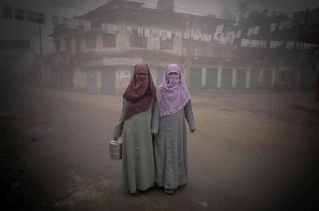Two young women on their way to work in Comilla