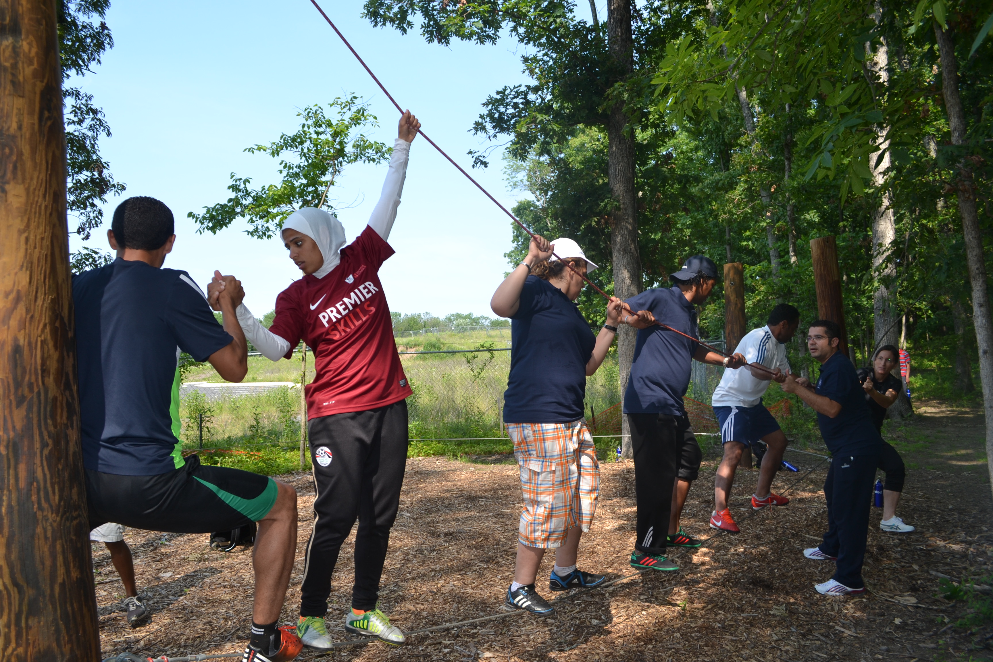 NEA participants worked together to accomplish different challenges at The Edge ropes course. 