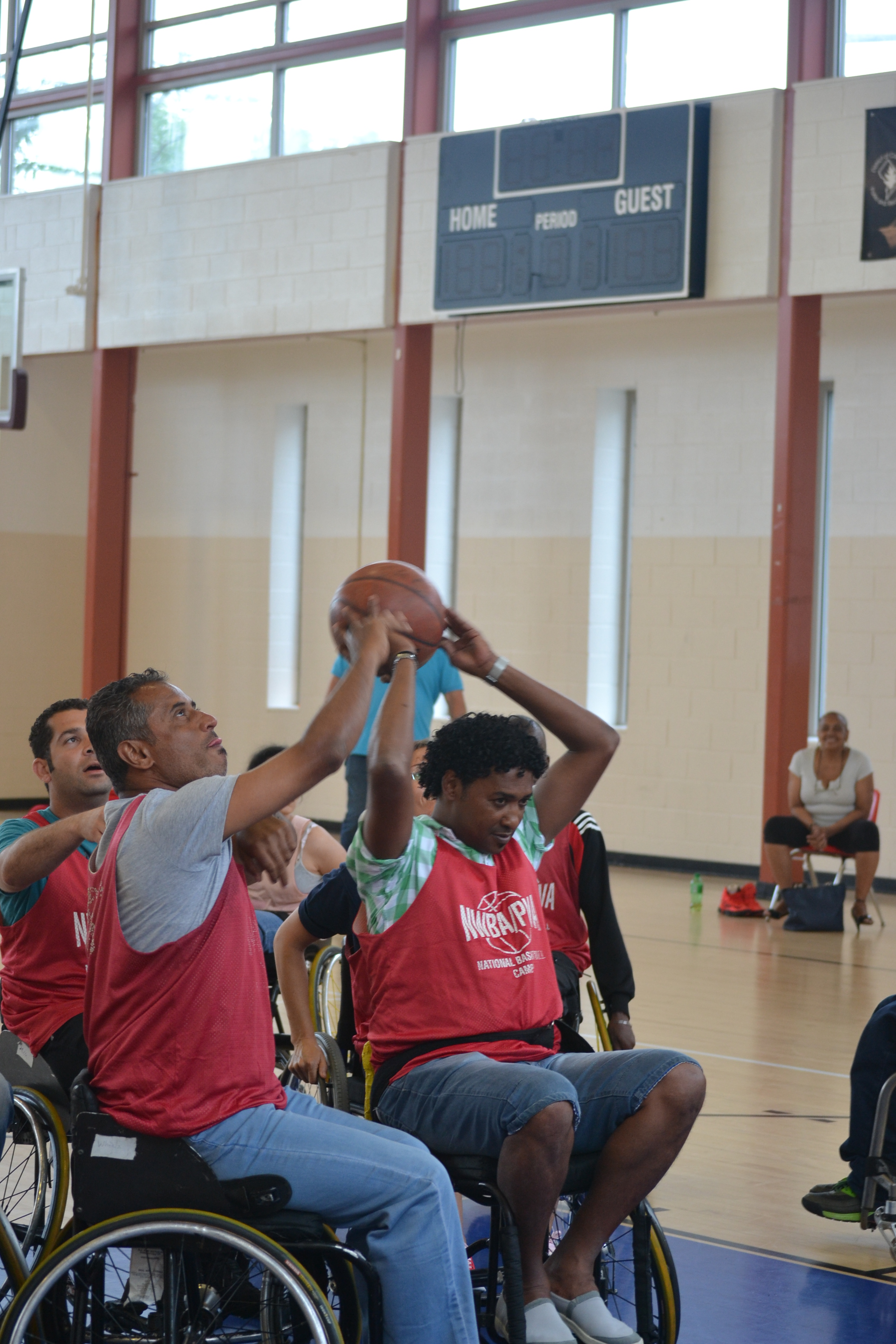 The group tries a new sport, wheelchair basketball, and furthers their teamwork skills at the same time. 