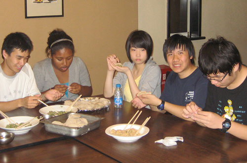 NSLI-Y students from Chicago Public Schools learn to wrap jiaozi (Chinese dumplings) at East China Normal University, Shanghai, China.