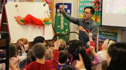 Yu Bo was a Chinese teacher at Arlington High School in Massachusetts during the 2011-2012 school year. He is pictured doing outreach for elementary school children about the Chinese New Year.