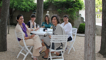 photo of IVLP WeAmericas participants talking at table
