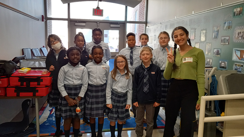Noura with a class of students
