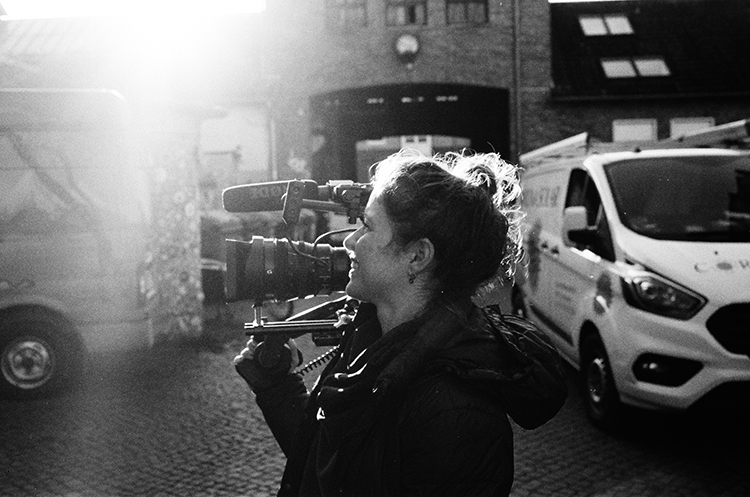 McKinleigh holding her camera