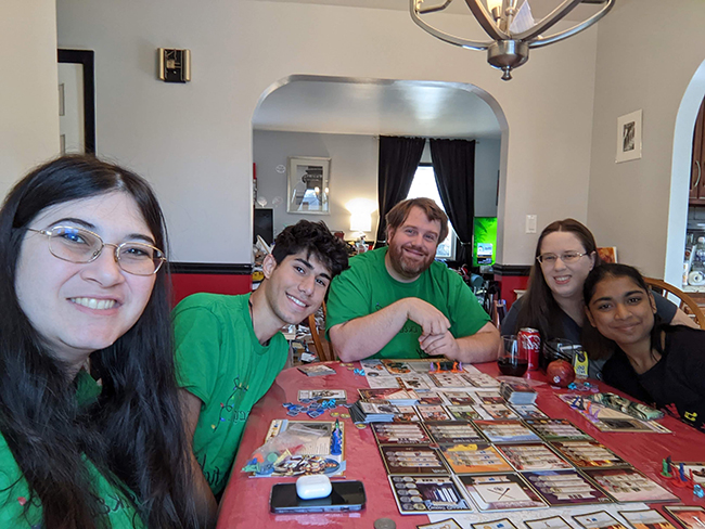 Yazan playing board games with his host family.