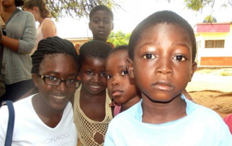 Precious (left) with kids in her Accra, Ghana neighborhood