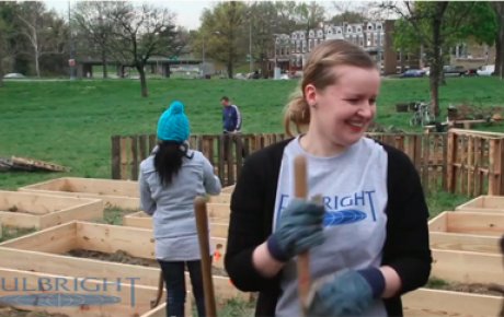 Fulbright Seminar participant, helping to create a community garden.