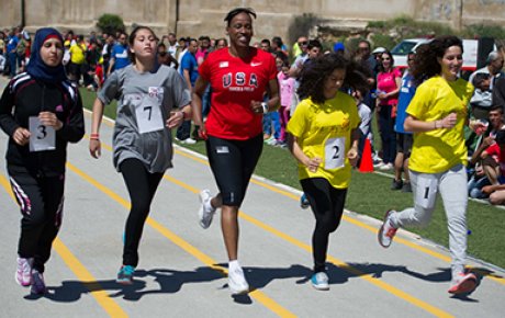 Jackie takes a jog and connects with young women on an individual basis