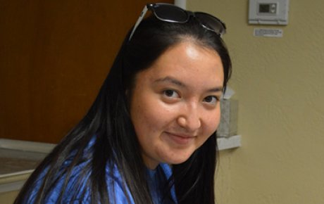 Kyrgyz FLEX student Kamila volunteers at a church in her host community that cooks meals for homeless residents. 