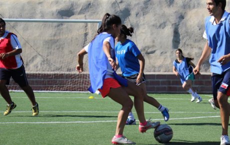 A soccer clinic engages a group of 12-14 year-olds from Lo Espejo, an economically-marginalized community outside of Santiago, Chile.