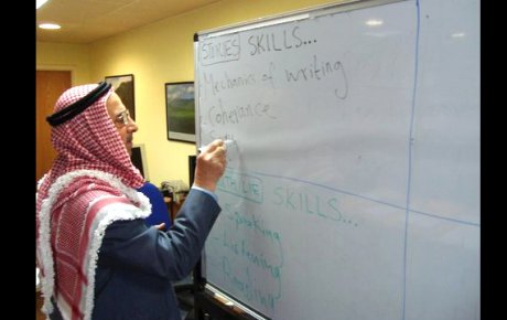 A Jordanian Ministry of Education supervisor participates in a workshop the American Language Center in Amman.