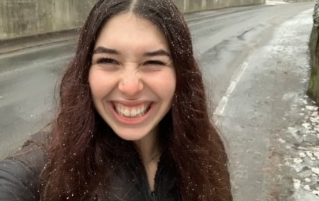 Selfie of Chloe standing on a road
