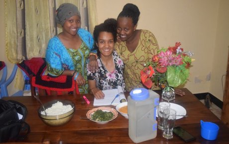 Sabrina Hassan eating meal with host family