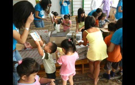 First Place: "After food and books drive at the orphanage!"