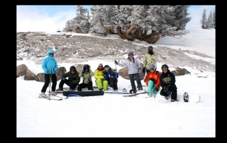 The group of Kyrgyzstani snowboarders get ready to ride.