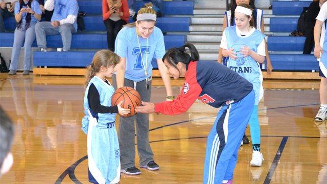 The players take part in a games and skills practice with Special Olympic athletes.